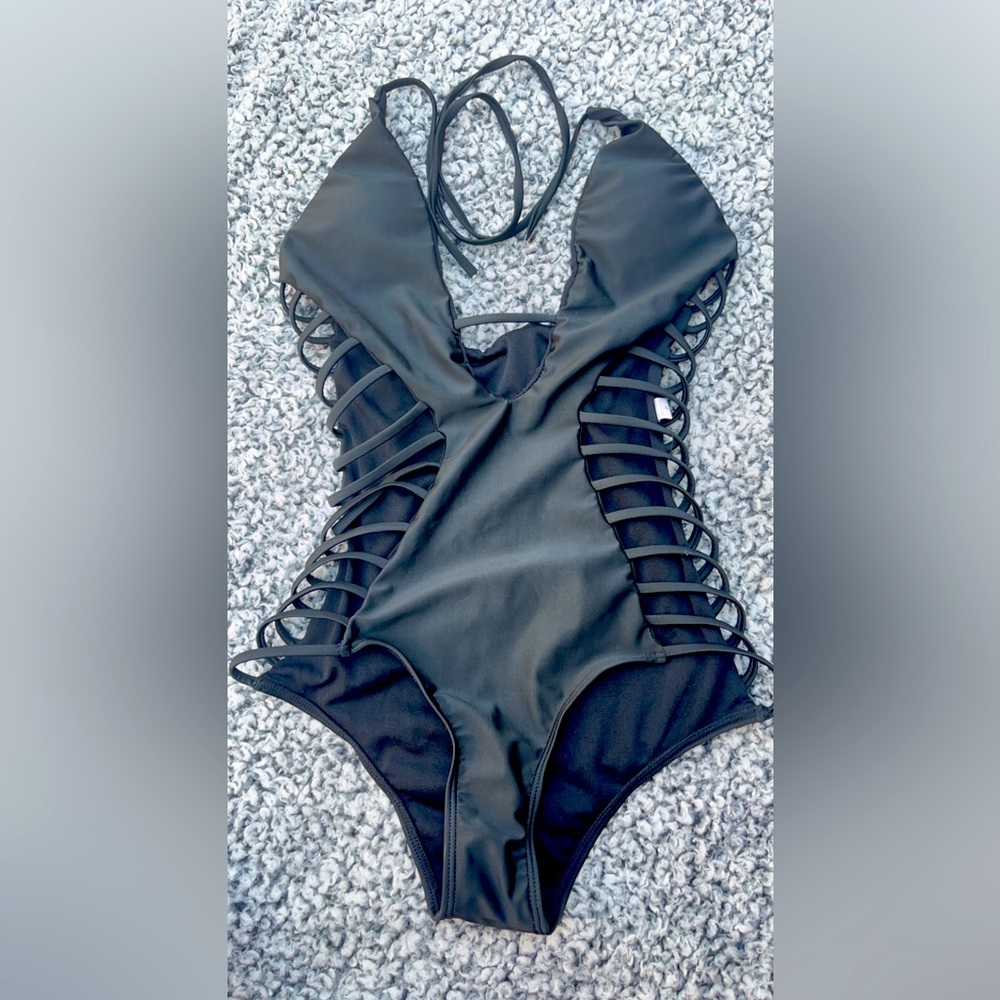 Black one piece. Super adorable.